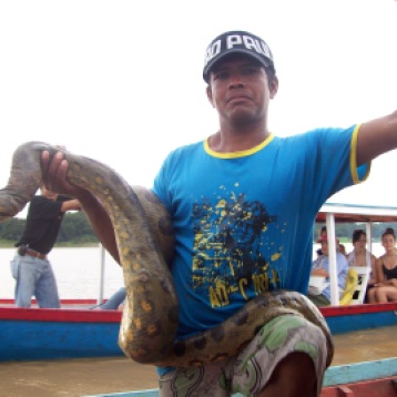 Man and his Anaconda snake!